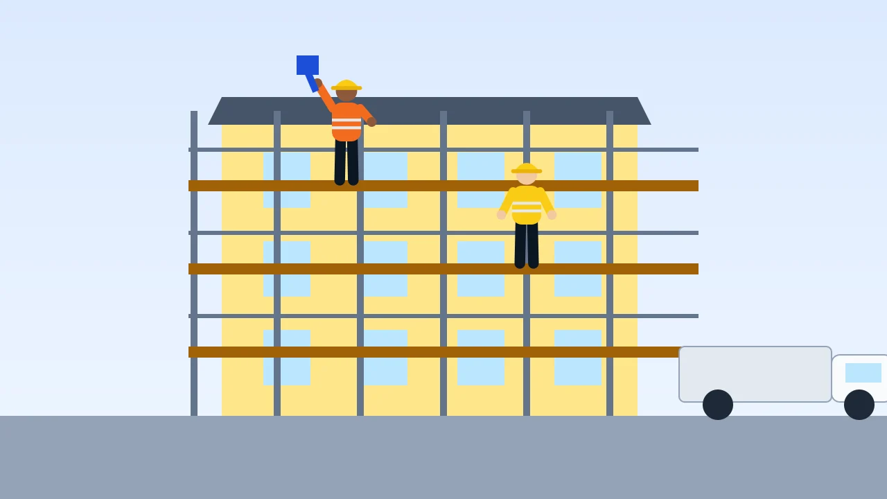 Scaffolding on the front of a building with painters working at height